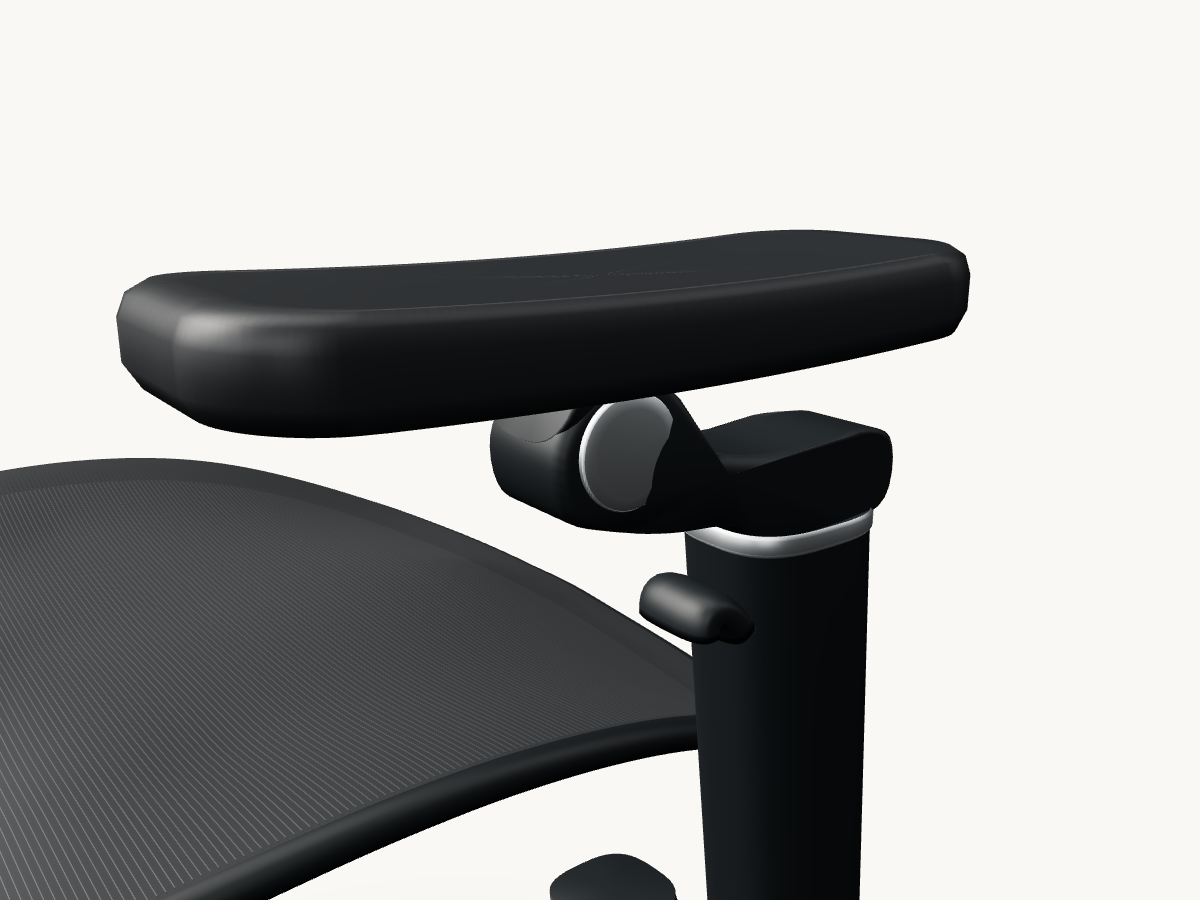 Close-up of the adjustable armrest pad and its supporting column.